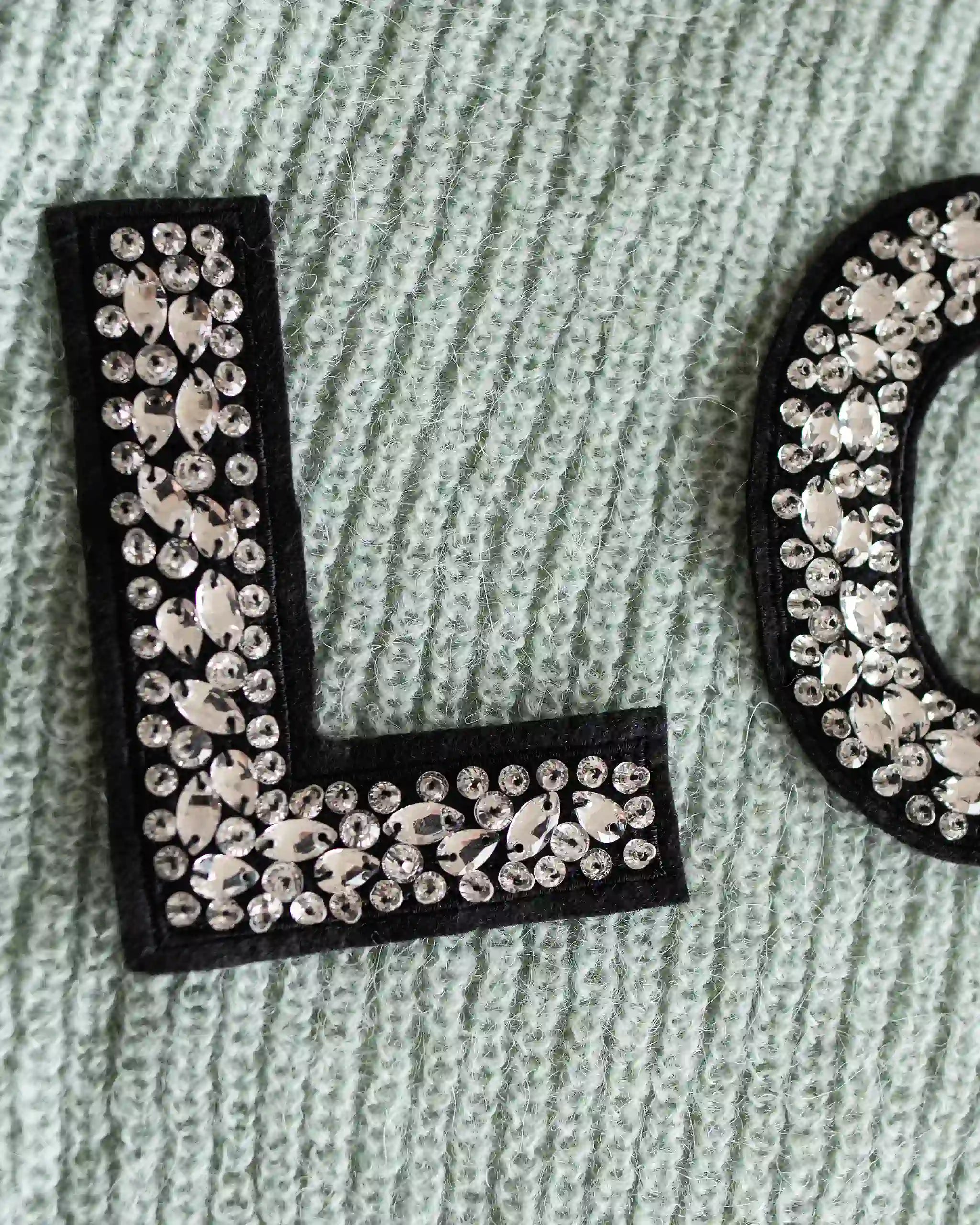 Detail LOVE Aufschrift salbeigrün