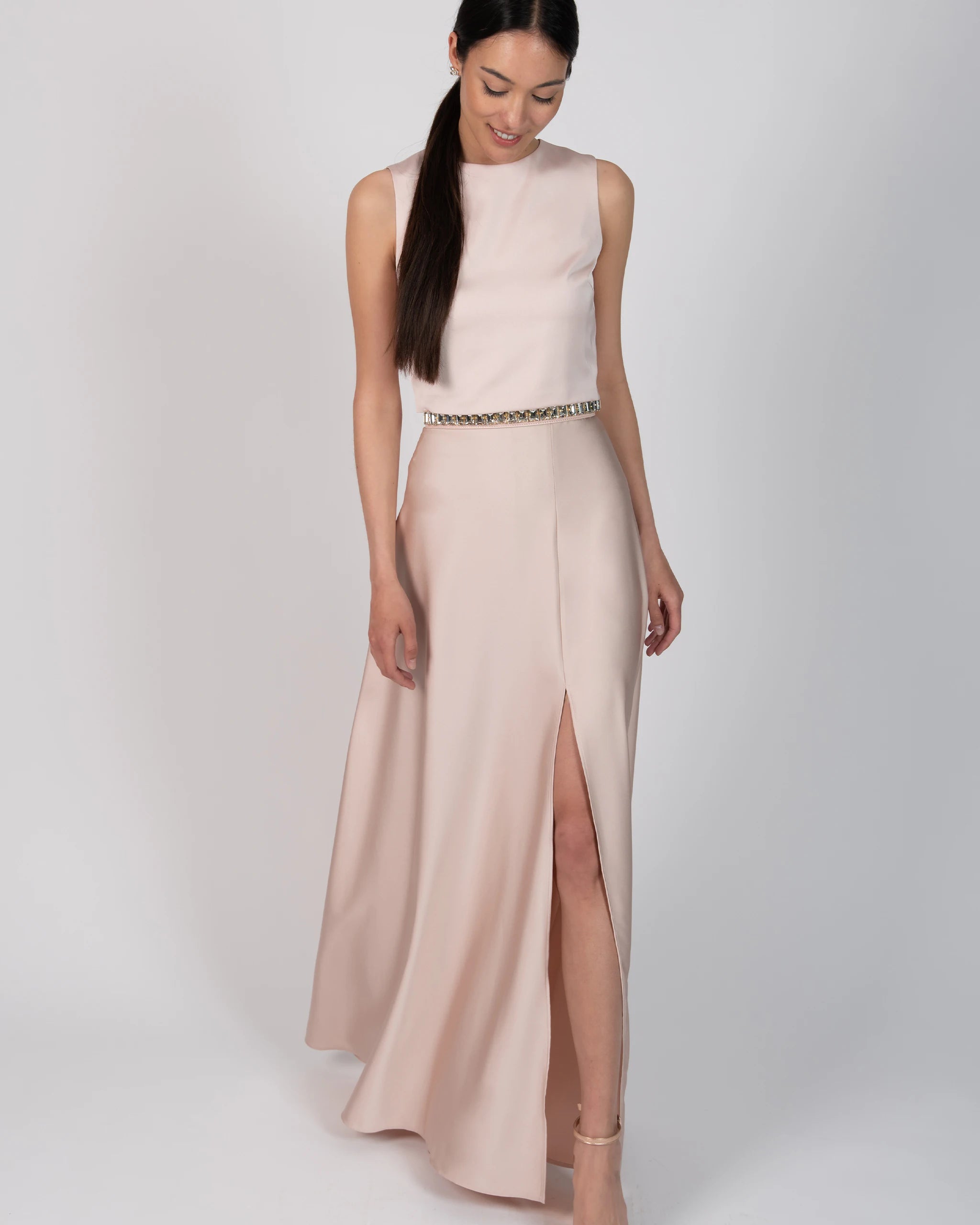 Ärmelloses Crop Top mit rundhals Ausschnitt in rosa Ansicht vorne