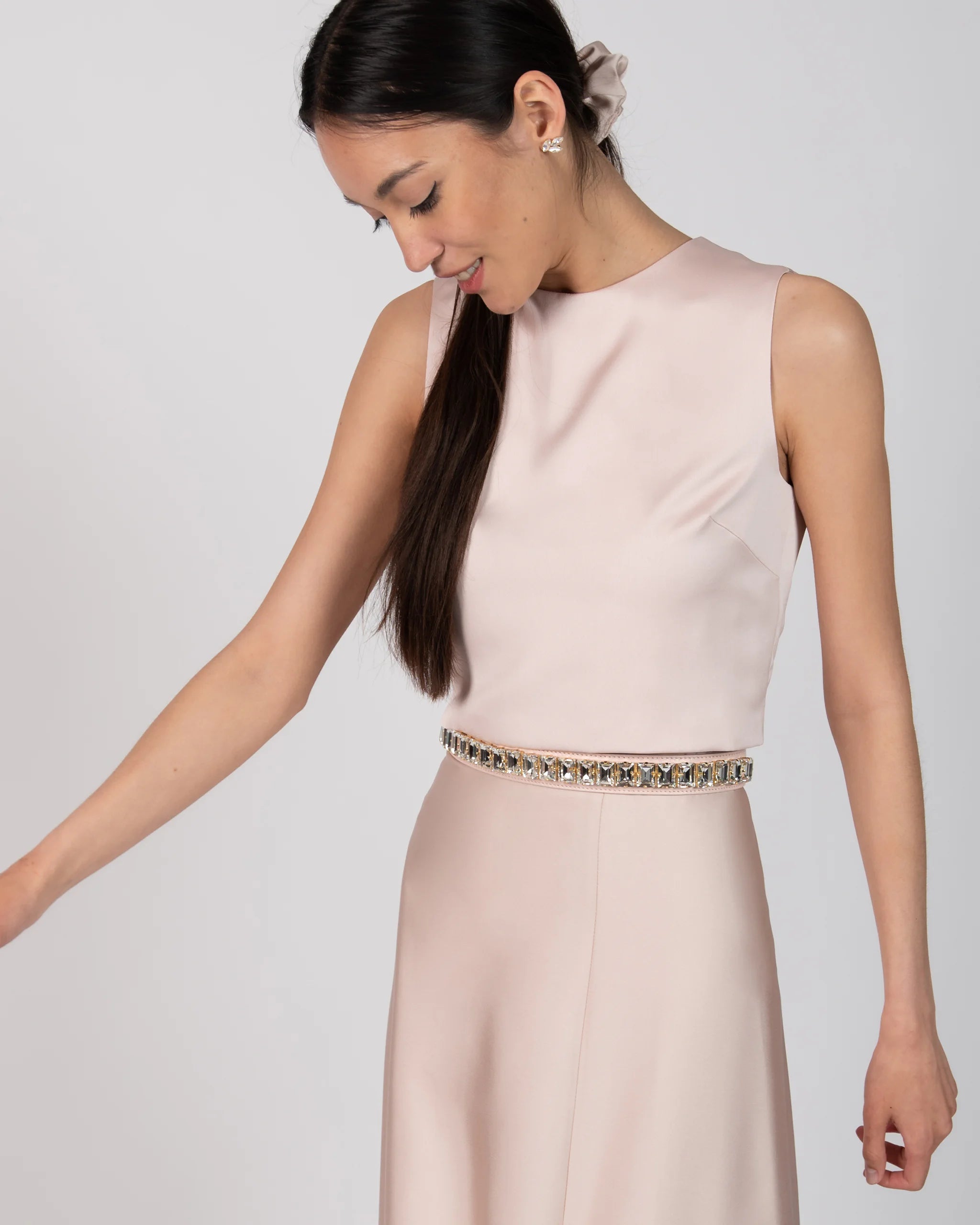 Ärmelloses Crop Top mit rundhals Ausschnitt in rosa Ansicht seitlich