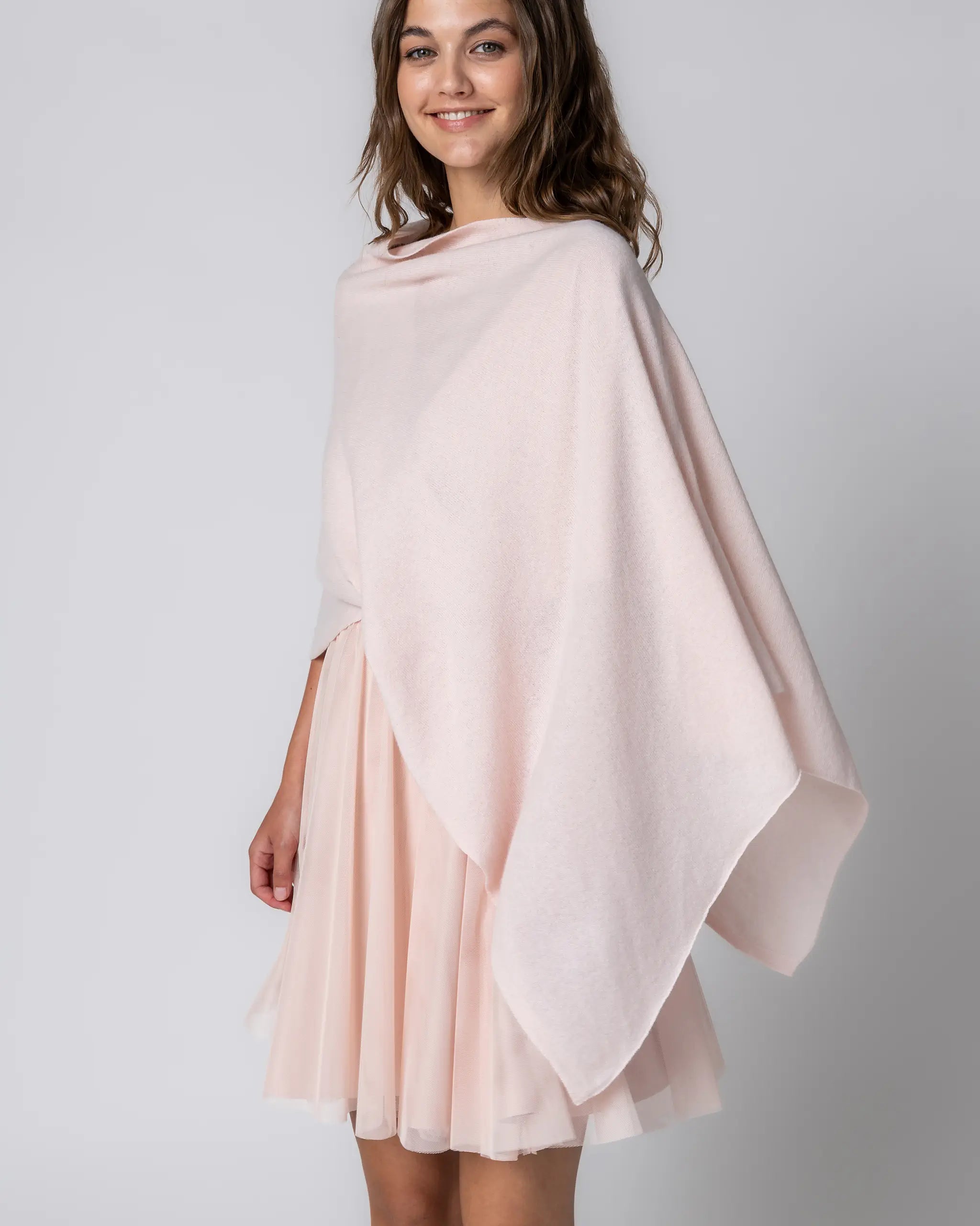 Poncho in rosa Ansicht seitlich