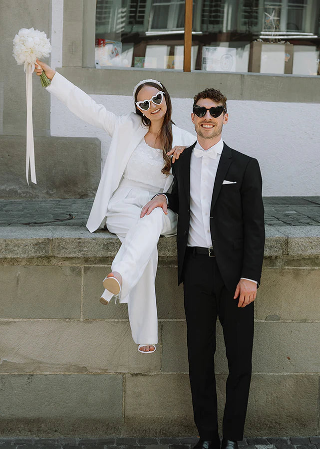 Piqyourdress Schweiz Braut in einem Hochzeitskleid mit Hosenanzug Hochzeit