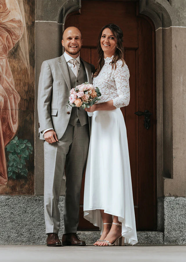 Piqyourdress Schweiz Braut in einem Hochzeitskleid mit Spitze und Satinrock