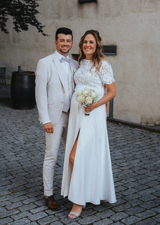 Piqyourdress Schweiz Braut in einem Brautkleid für Schwangere mit Spitzen Top und Satinrock