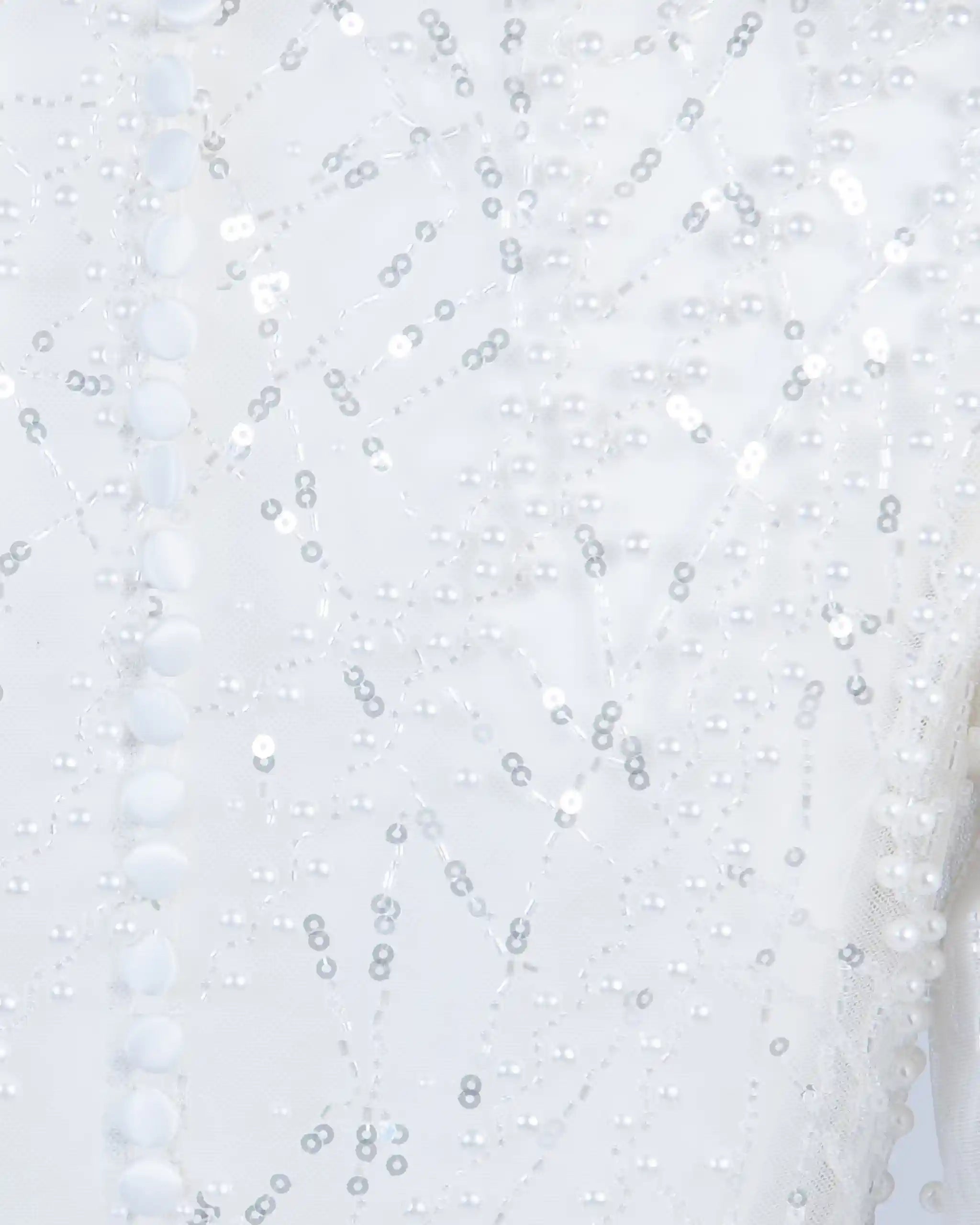 Stoff Detail ivory beaded tulle