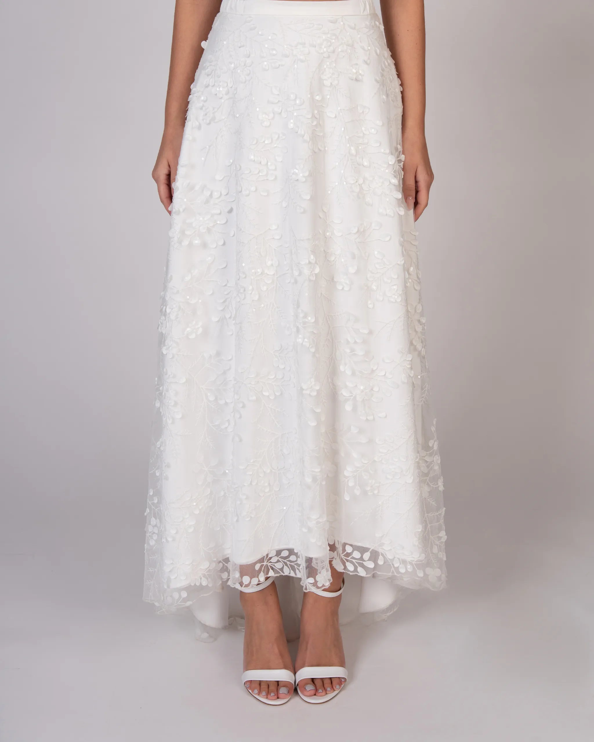 Asymmetrischer Tüllrock mit 3D-Blätter und Pailletten Detailansicht vorne